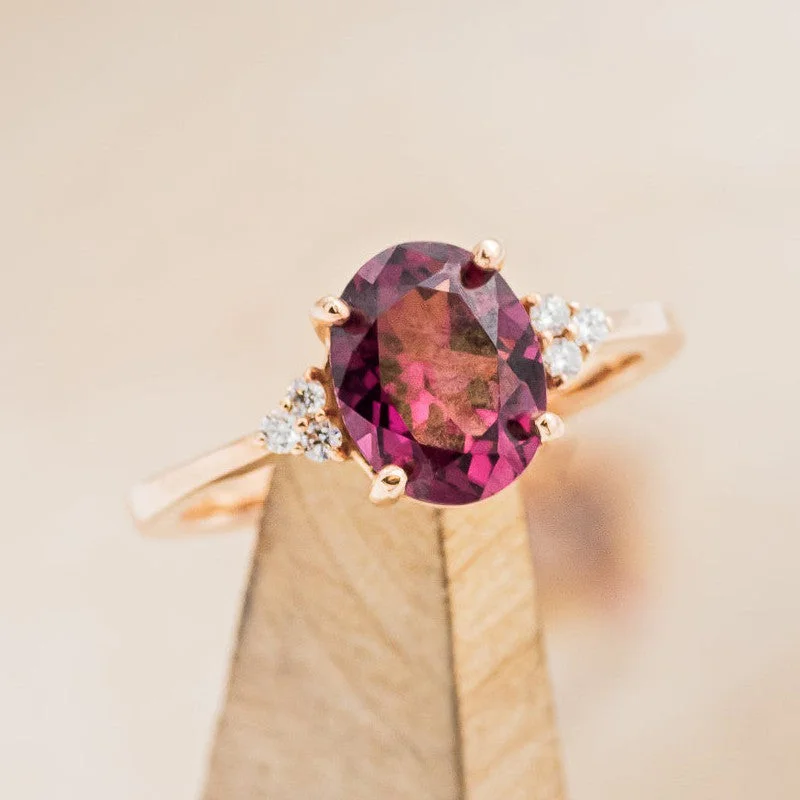 OVAL RHODOLITE GARNET ENGAGEMENT RING WITH DIAMOND ACCENTS