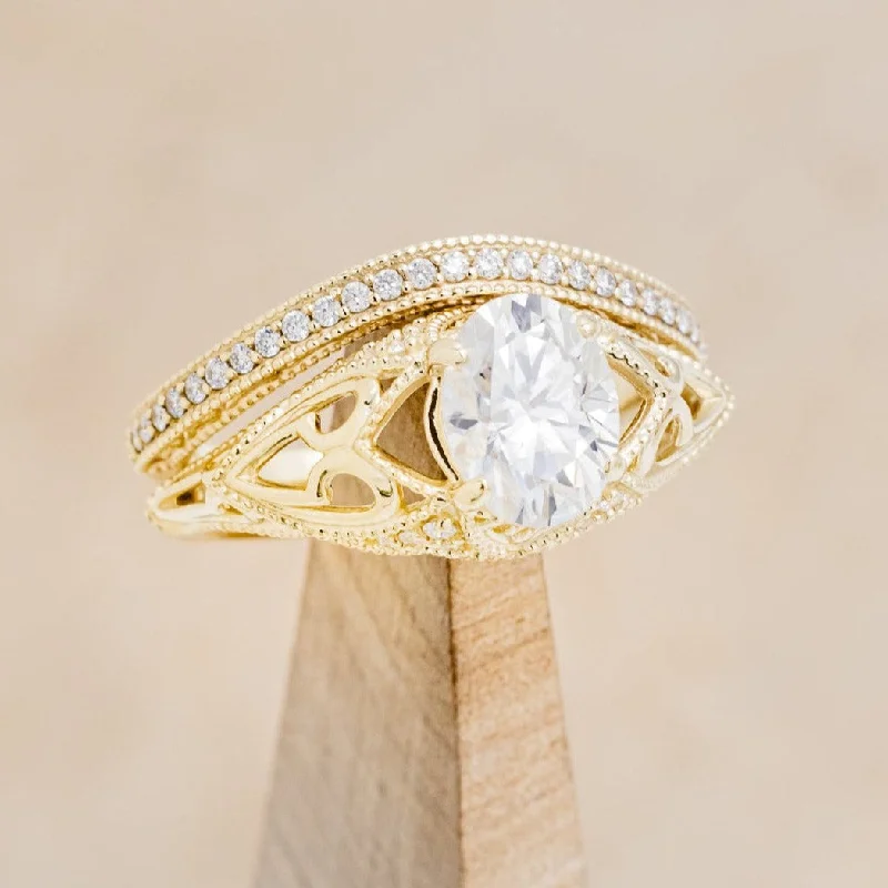 "RELICA" - OVAL MOISSANITE ENGAGEMENT RING WITH DIAMOND ACCENTS & DIAMOND TRACER