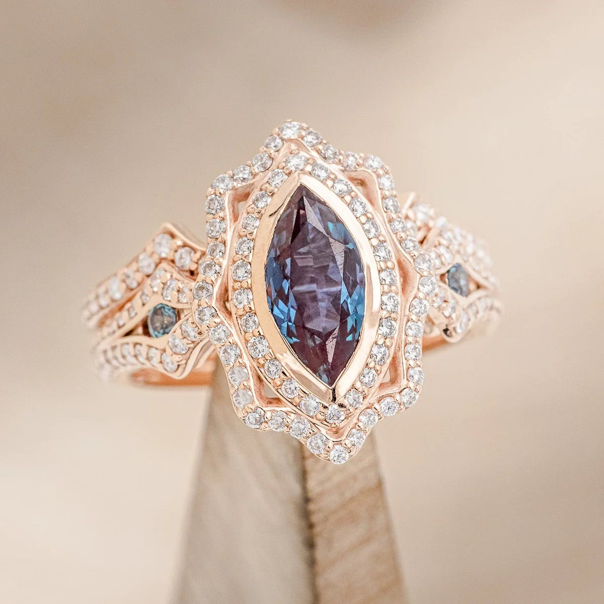 "ADELE" - MARQUISE LAB-GROWN ALEXANDRITE ENGAGEMENT RING WITH ALEXANDRITE ACCENTS, DIAMOND HALO & TRACER