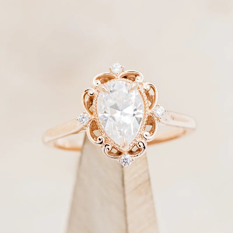 "VERA" - PEAR CUT MOISSANITE ENGAGEMENT RING WITH DIAMOND ACCENTS